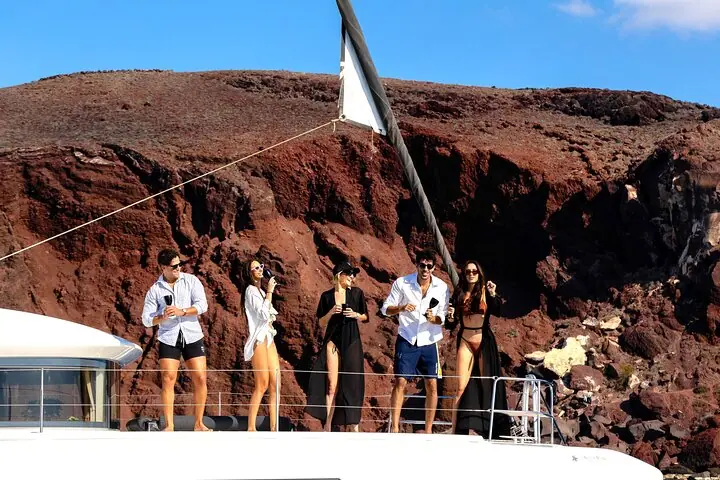 Half-Day Exclusive Catamaran Cruise in Santorini with Meal and Open Bar — 4