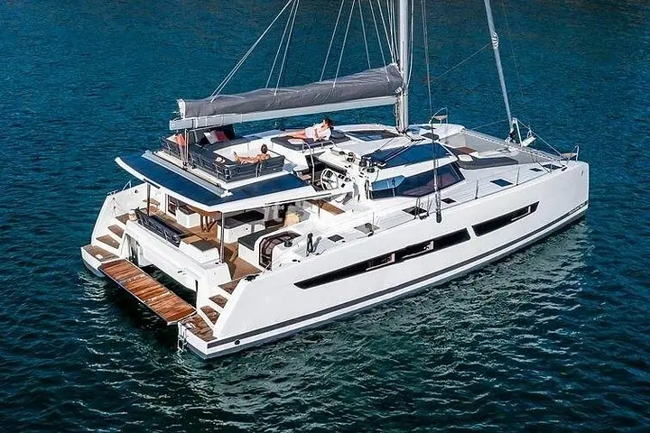 Mykonos: Brand-New Catamaran Cruise with Meal, Drinks & Transport